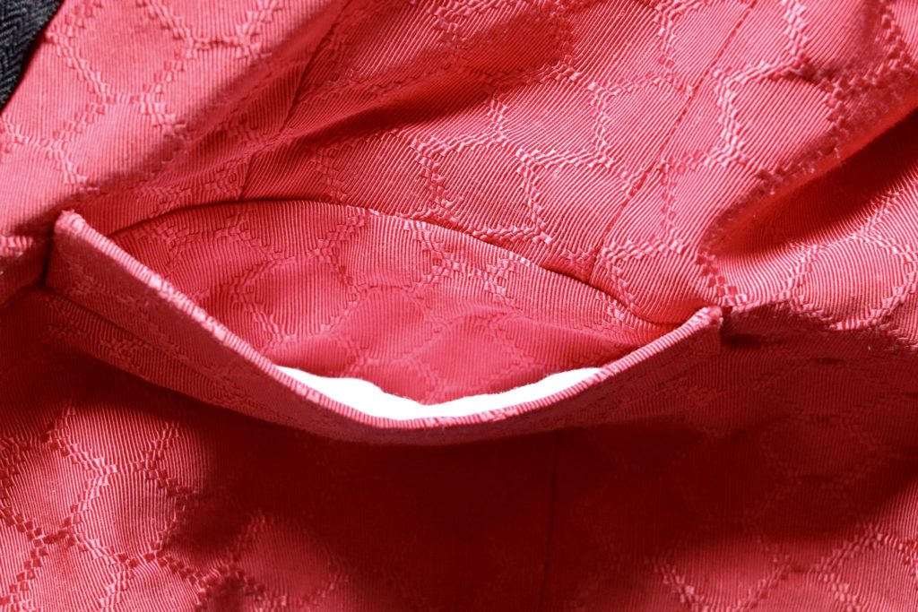 Détail poche à rabat